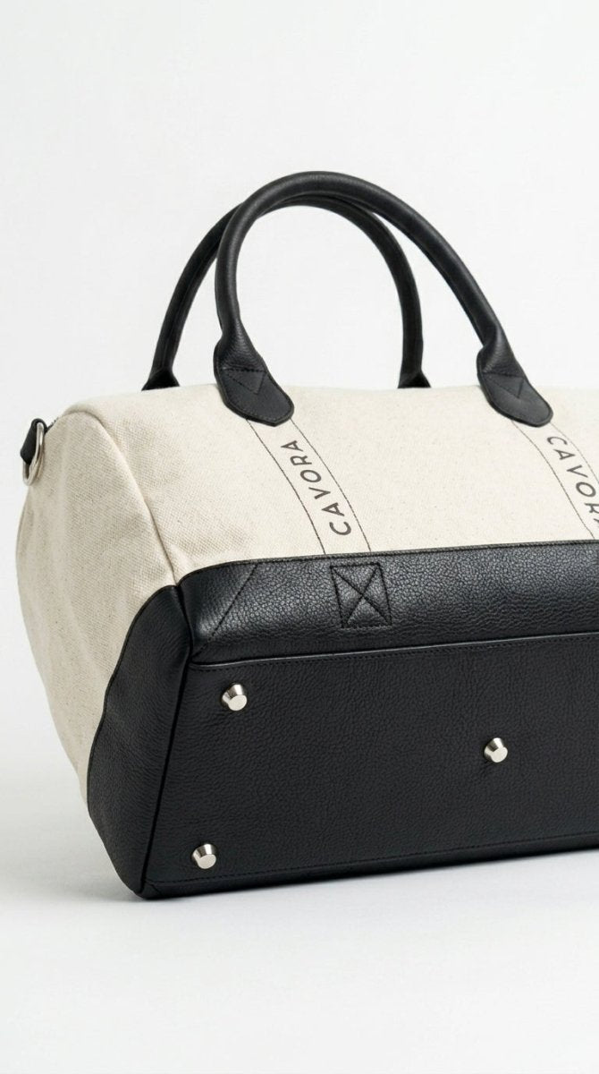 Black and beige handbag with 'Cavolora' branding on a white background