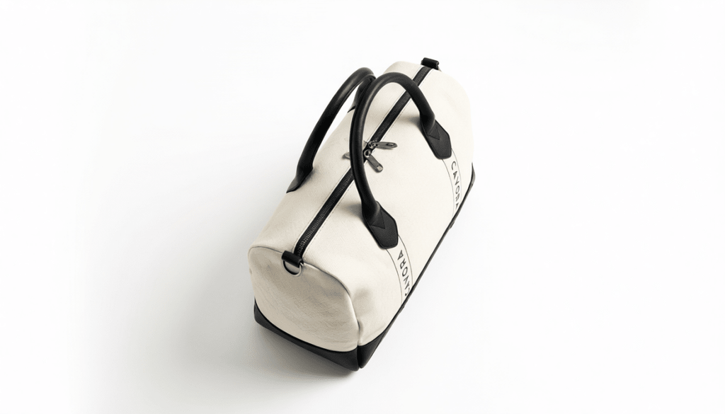 White duffel bag with black straps on a white background